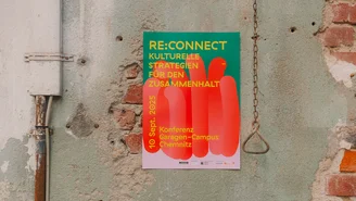 Plakat auf einer Steinwand