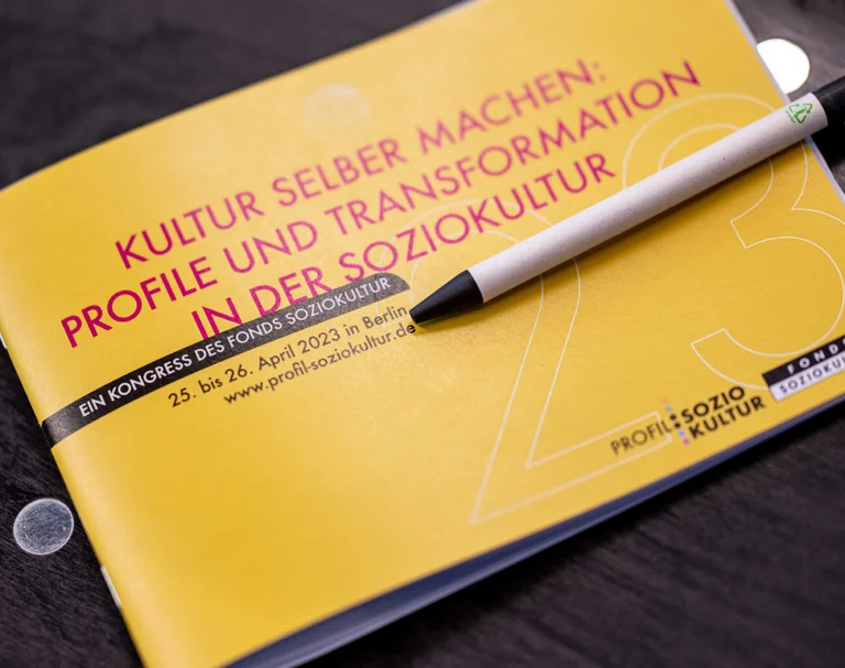 the programme booklet of the congress lies on a chair