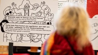 a poster with comics and text