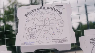 Gestalteter Pizzakarton mit der Frage: Was brauchst du, um dich zugehörig zu fühlen? Auf dem Karton sind verschiedene "Pizzazutaten" wie Respekt, Vertrauen oder gute Bäckerei, die angekreuzt werden können.
